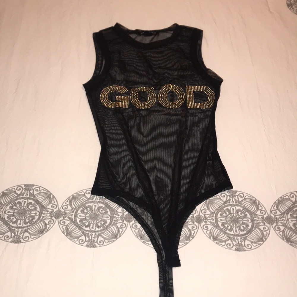 A sheer see thru bodysuit
